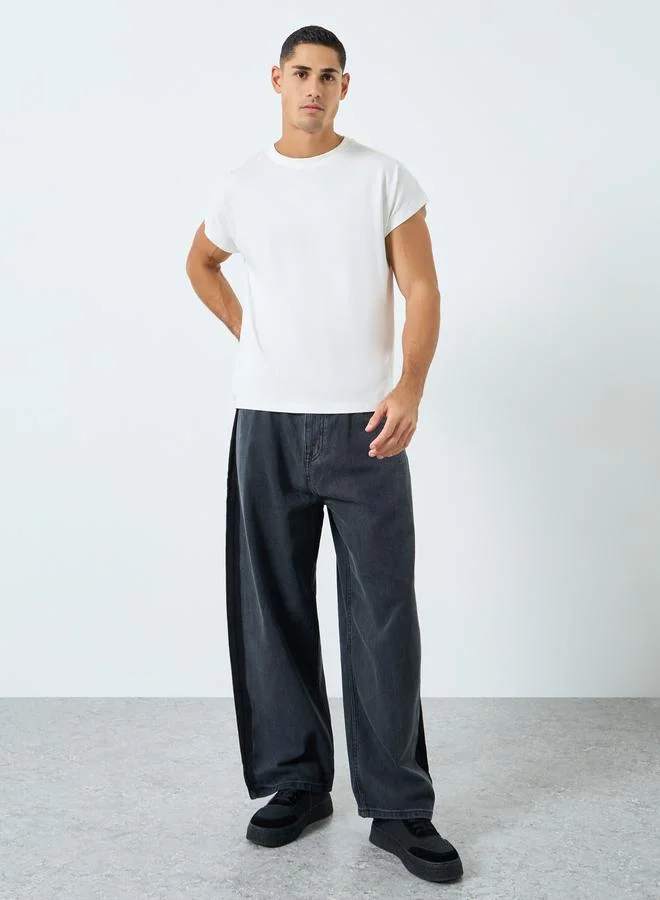 ستايلي اكتيف بلوزة جيرسي واسعة بأكمام قصيرة وطبعة جرافيك